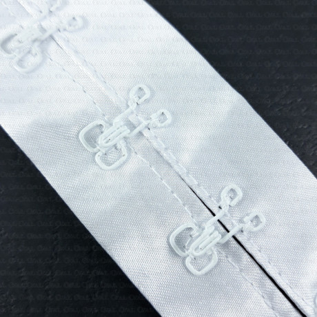 White hooks and eyes on satin tape 1m 2233