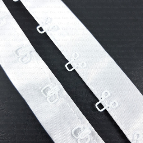 White hooks and eyes on satin tape 1m 2233
