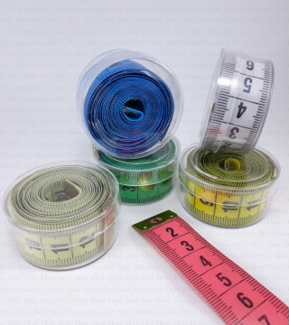 tape measure, measuring tape, tailor’s tape measure,