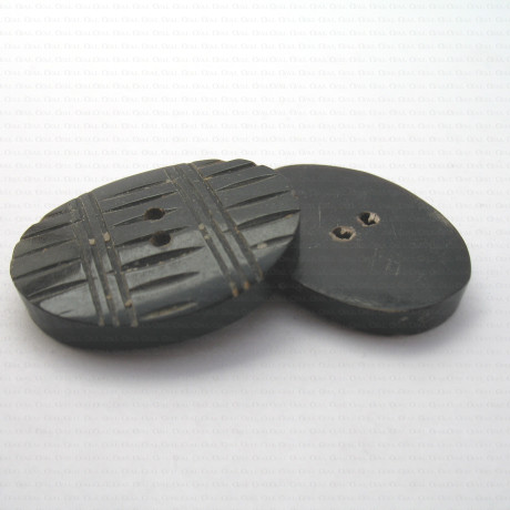 Polyester button 21x30mm no. 636