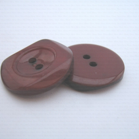 Guzik plastikowy 34mm nr.653