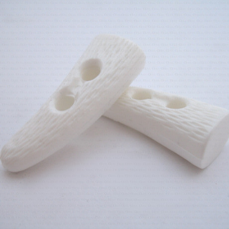 Guzik plastikowy 18x41mm nr.645