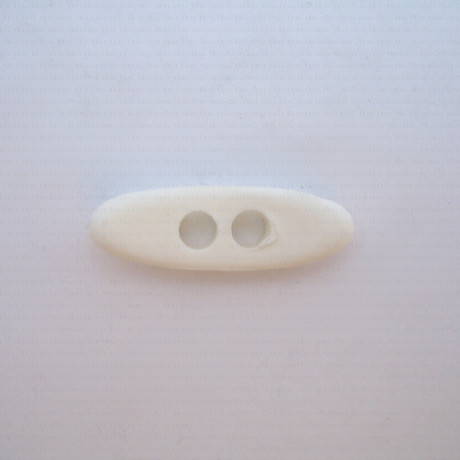 Plastic button 12x39mm no.657