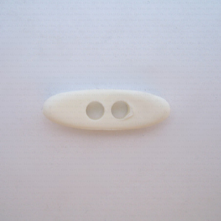 Plastic button 12x39mm no.657