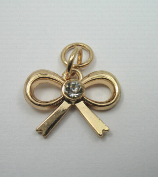 Metal pendant – gold bow no. 733