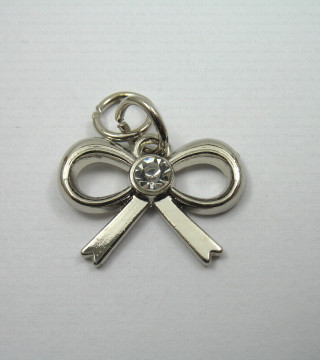 Metal tag – silver bow no. 722