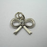 Metal tag – silver bow no. 722