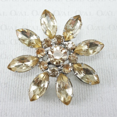 Metal brooch with stones 2207