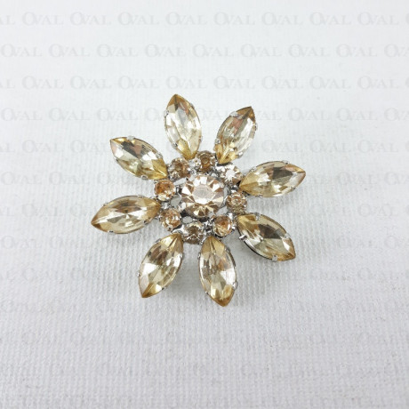 Metal brooch with stones 2207