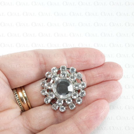 Metal brooch with stones 1573