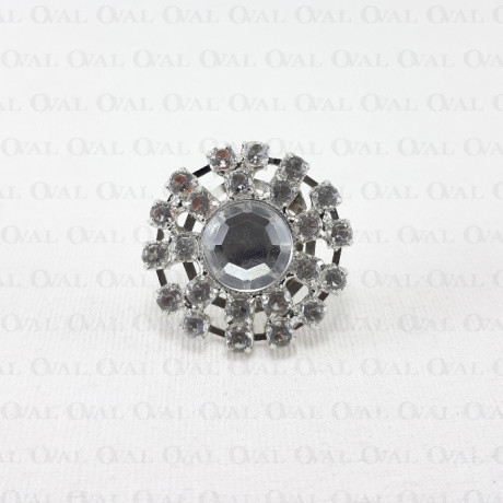 Broszka metalowa z kamieniami  1573