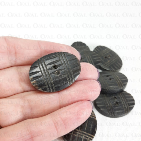 Polyester button 21x30mm no. 636