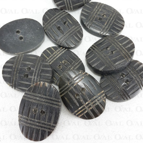 Polyester button 21x30mm no. 636