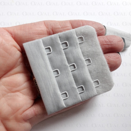 Zapięcie do biustonosza  50mm/1,10 lub 100szt jasno szary 5384