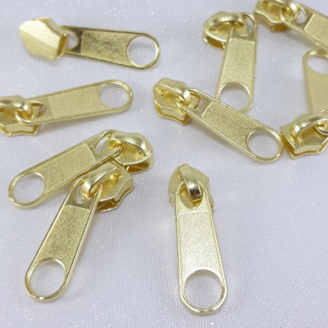 Maszynka do suwaka – zamki błyskawiczne i naprawa suwaków