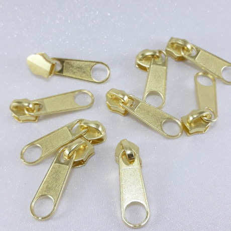 Maszynka do suwaka – zamki błyskawiczne i naprawa suwaków