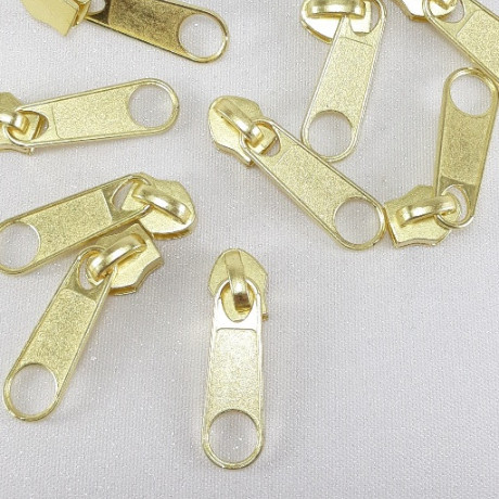 Maszynka do suwaka – zamki błyskawiczne i naprawa suwaków