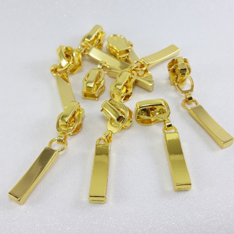 Maszynka do suwaka – zamki błyskawiczne i naprawa suwaków