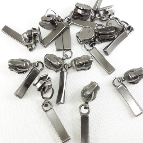 Maszynka do suwaka – zamki błyskawiczne i naprawa suwaków