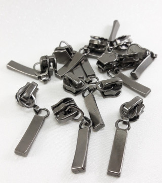 Maszynka do suwaka – zamki błyskawiczne i naprawa suwaków