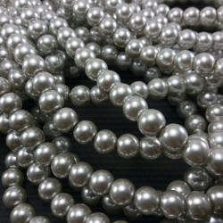Perła szklana na sznurze,kolor szaro -beżowy 1855 Perła szklana na sznurze,kolor szaro -beżowy 1855