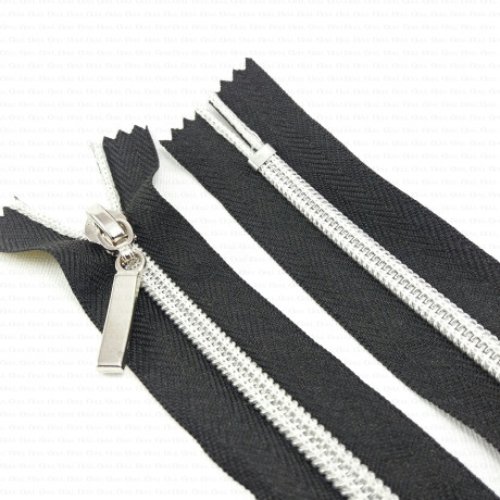 Decorative zips with a silver thread, various lengths, 1953
