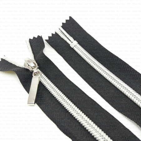 Decorative zips with a silver thread, various lengths, 1953