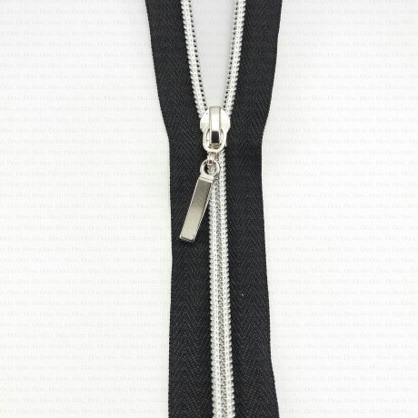 Decorative zips with a silver thread, various lengths, 1953