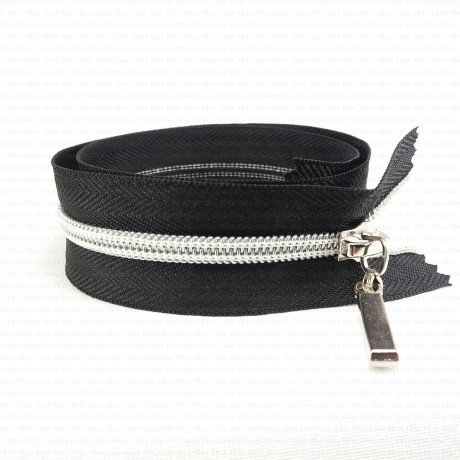 Decorative zips with a silver thread, various lengths, 1953