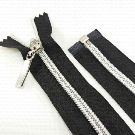 Zips with a silver thread 16–70 cm, separating 1954