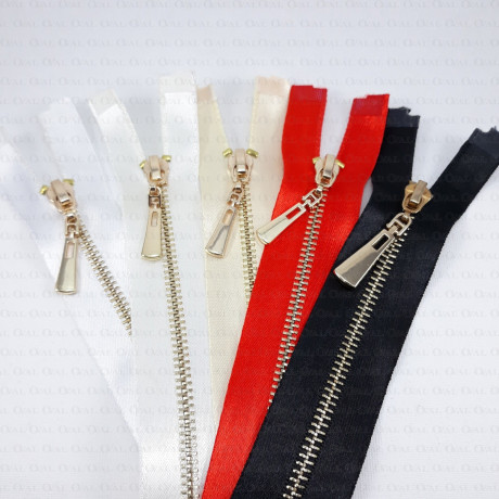 60 cm metal zips on satin tape/gold teeth 2247
