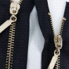 Non-separable metal zips, various lengths, gold/silver, 1951
