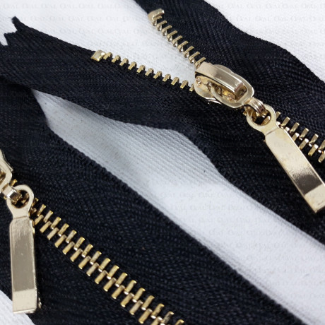 Non-separable metal zips, various lengths, gold/silver, 1951