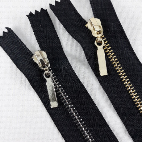 Non-separable metal zips, various lengths, gold/silver, 1951